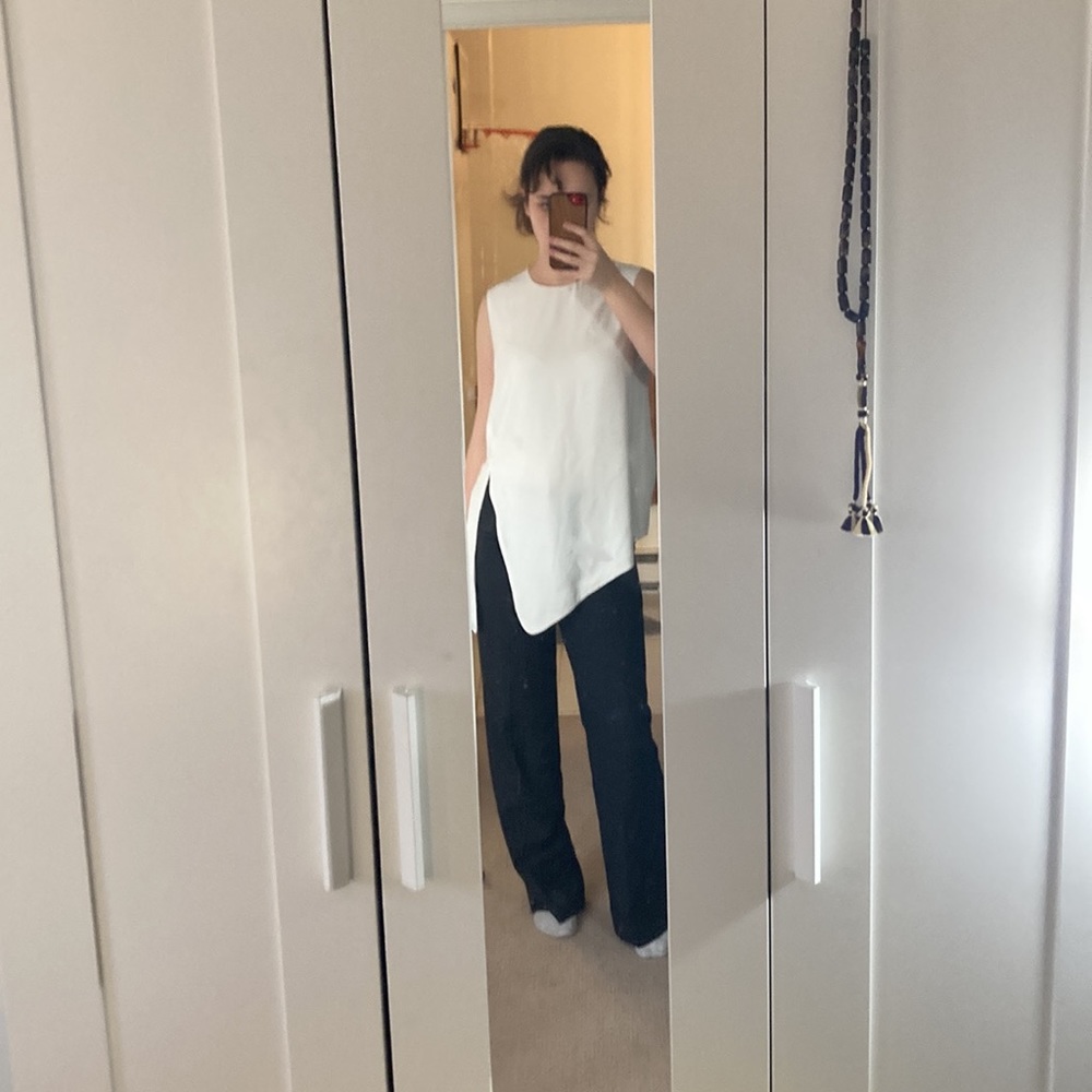 White sleeveless top